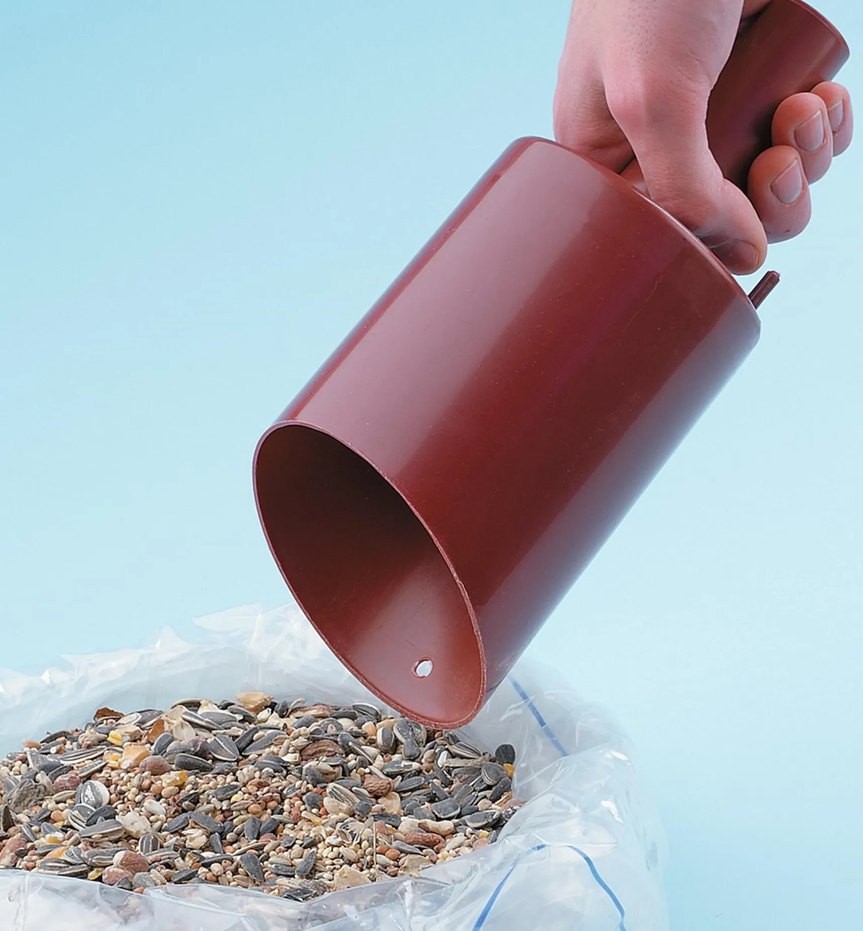 Funneling Bird Seed Scoop Birding